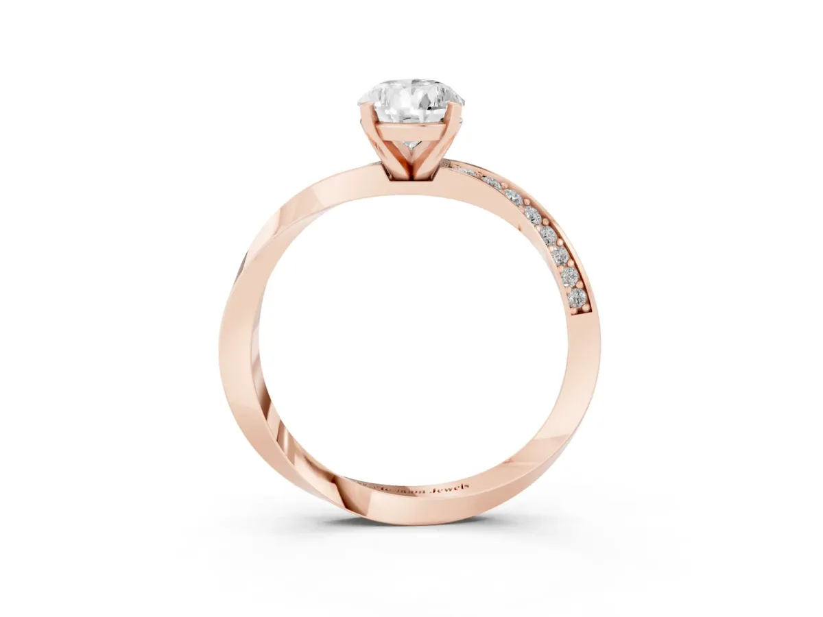 Pear Cut Diamond Engagement Ring with Side Stone Accents and Four-Prong Setting Rose gold