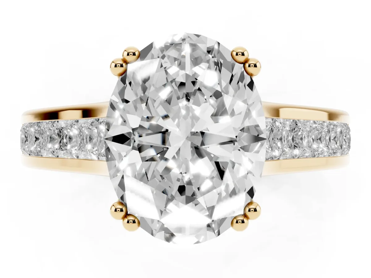 Oval Cut Cut Channel Set Solitaire Engagement Ring with Prong Setting Yellow gold