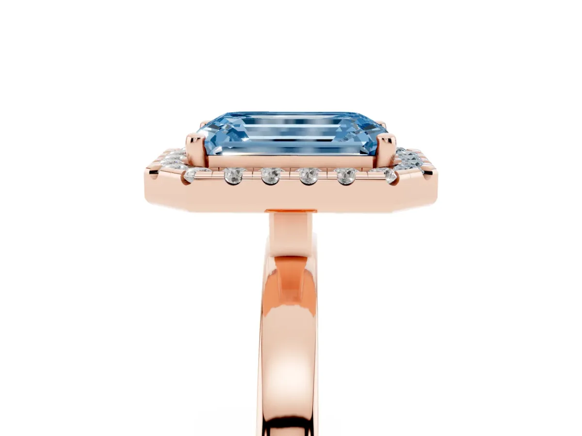 Fancy Blue Emerald Cut Halo Diamond Solitaire with Pavé Band and Four-Prong Setting Rose gold