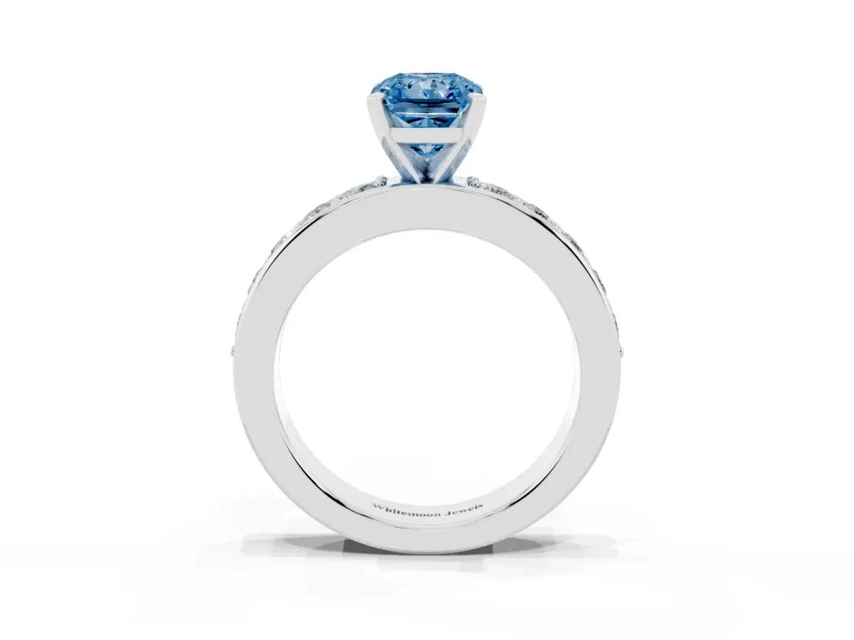 Fancy Blue Radiant Cut Diamond Engagement Ring with Channel Set Round Band and Prong Setting Silver
