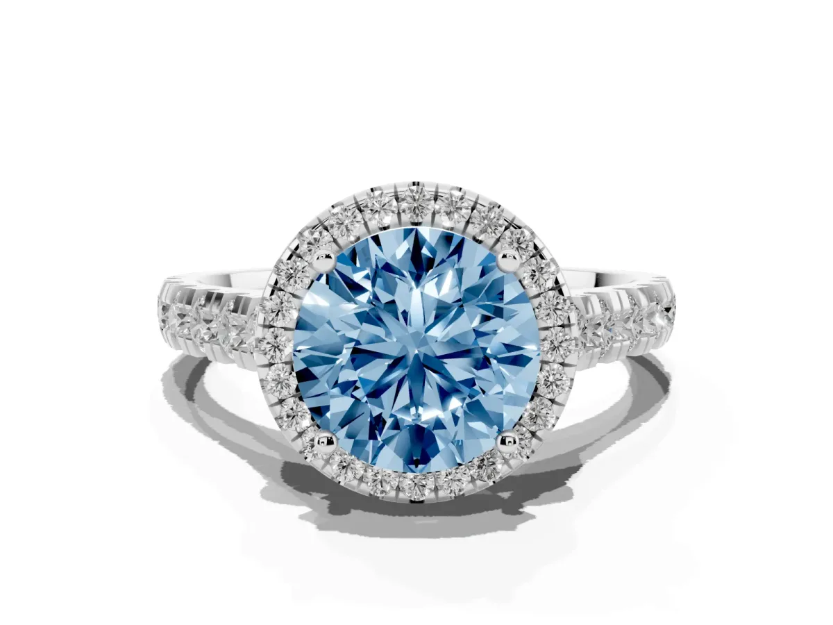 Fancy Blue Round Cut Halo Pavé Diamond Engagement Ring with Four-Prong Setting Silver