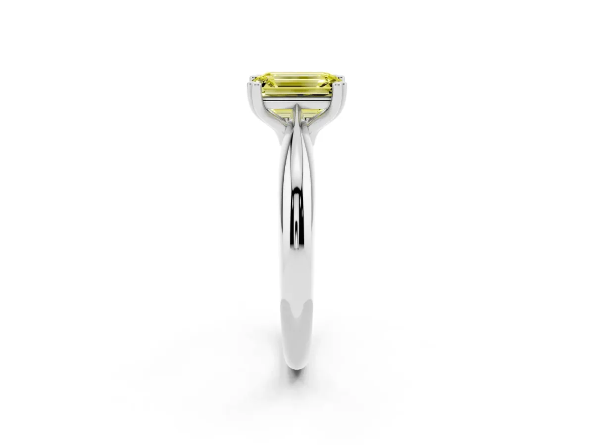 Fancy Yellow Emerald Cut Cut Solitaire Engagement Ring with Tapered Band and Four-Prong Setting Silver