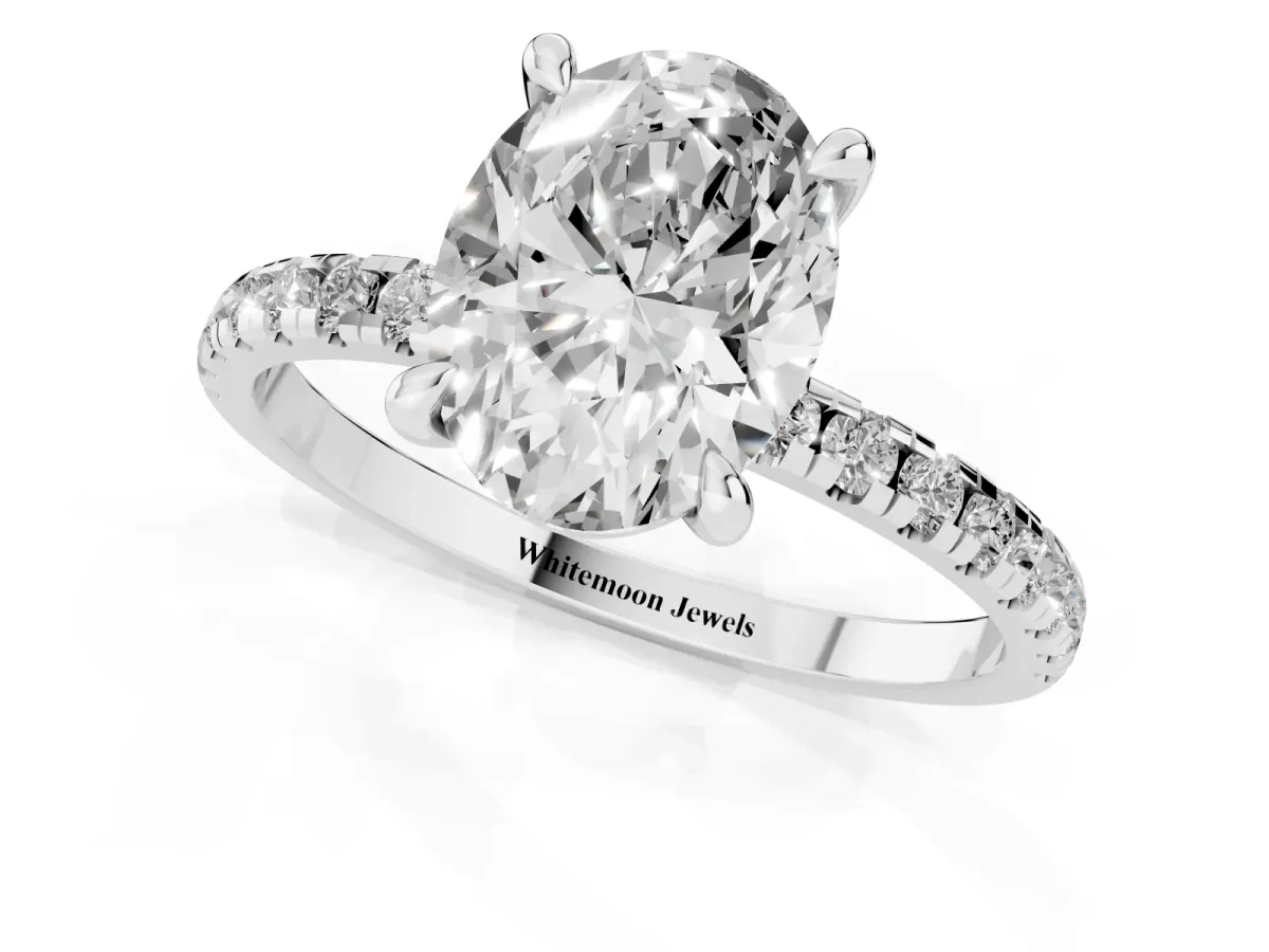 Oval Cut Diamond Brilliant Solitaire Ring with Pavé Band and Four-Prong Setting Silver
