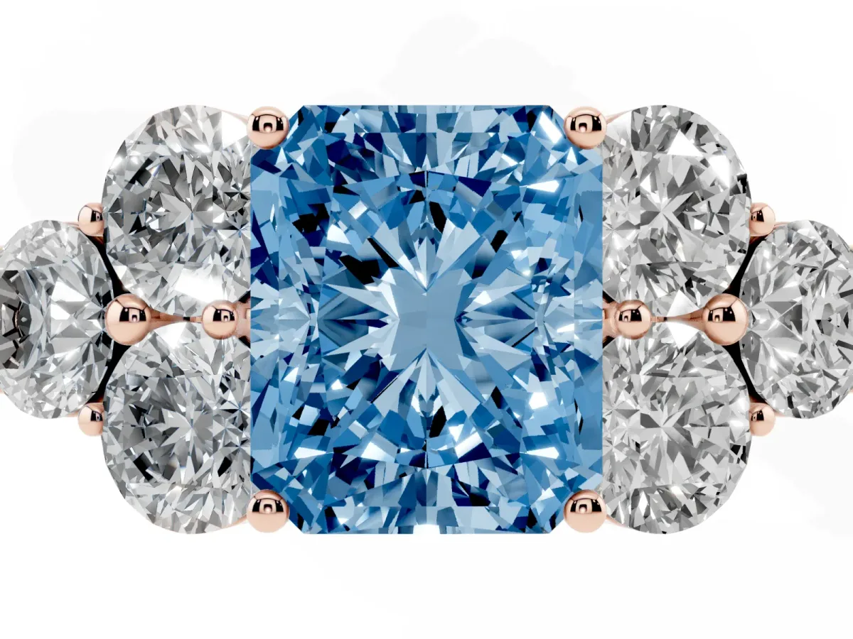 Fancy Blue Radiant Cut Cut Diamond Cluster Ring with Round Accent Stones and Prong Setting on a Classic Band Rose gold