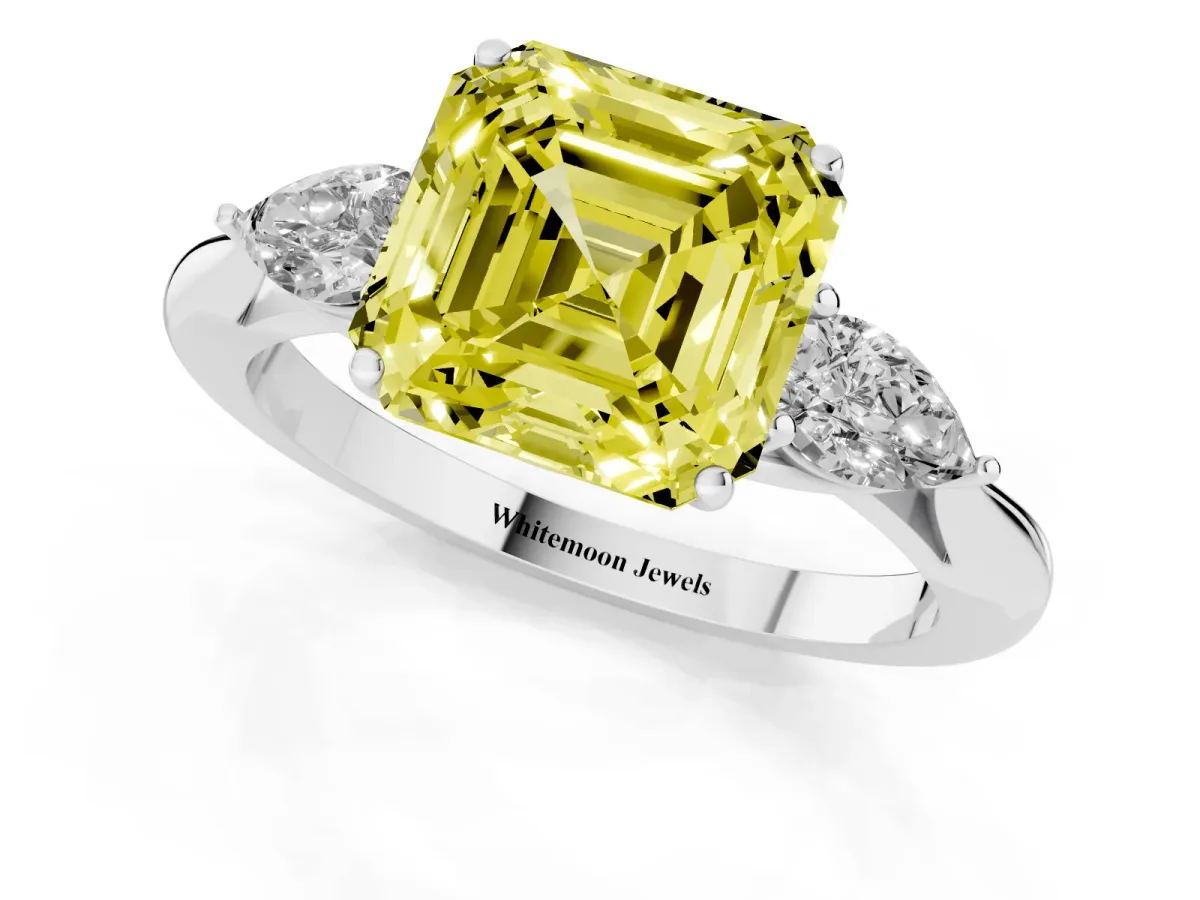 Fancy Yellow Three-Stone Asscher Cut Brilliant Diamond Solitaire Ring with Tapered Band and Four-Prong Setting Platinum