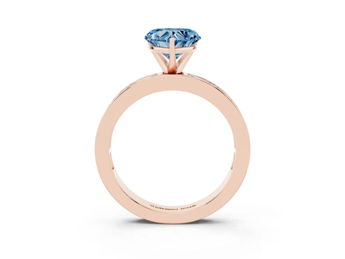 Fancy Blue Heart Cut Solitaire Diamond Ring with Channel-Set Baguette Band and Four-Prong Setting Rose gold