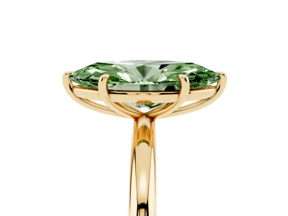 Fancy Green Marquise Cut Solitaire Diamond Ring with Four-Prong Setting on a Plain Band Yellow gold