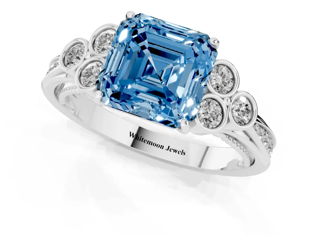 Fancy Blue Asscher Cut Cut Diamond Engagement Ring with Bezel Set Round Side Stones and Prong Setting Platinum