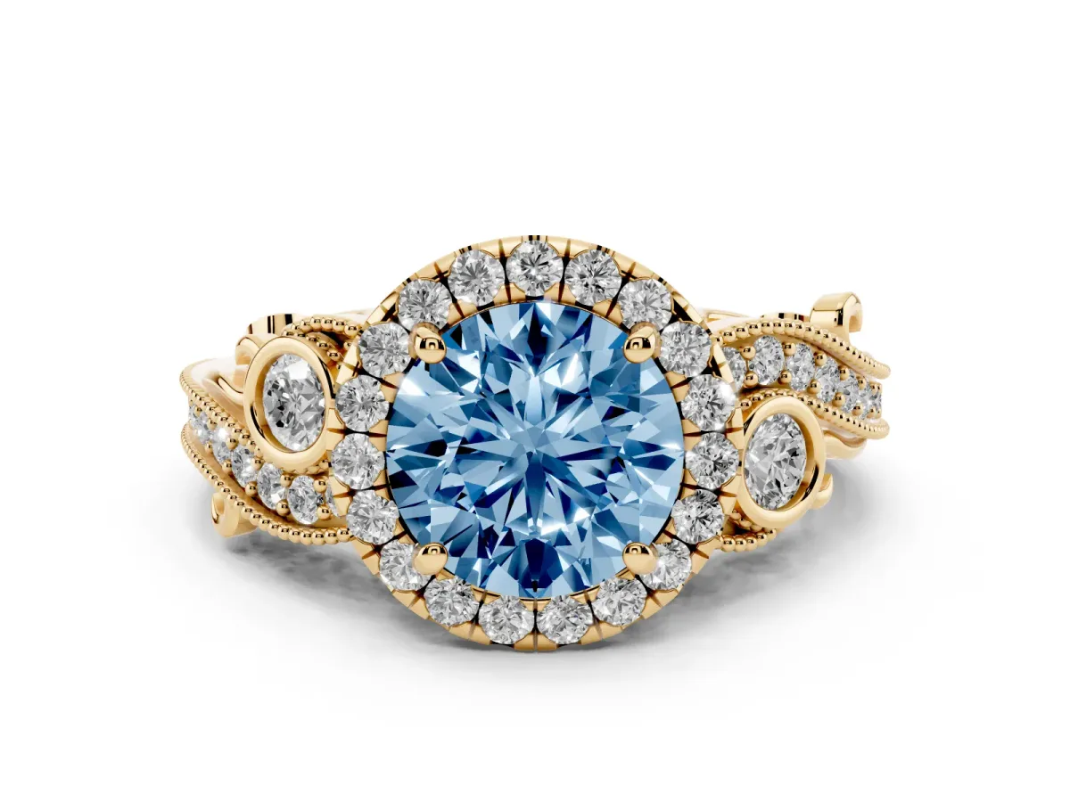 Fancy Blue Round Cut Diamond Halo Ring with Milgrain Pavé Band and Four-Prong Setting Yellow gold