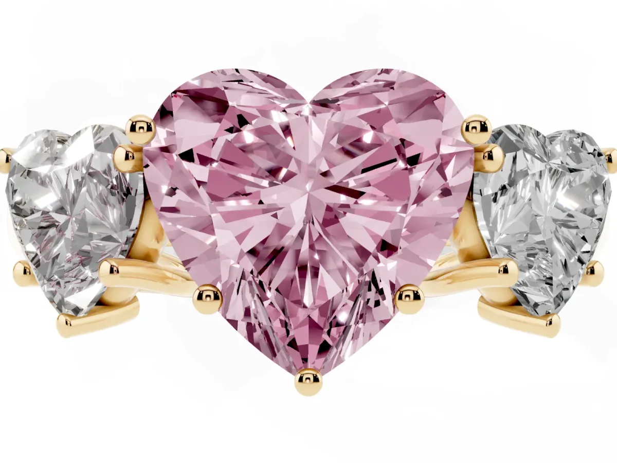 Fancy Pink Three-Stone Heart Cut Diamond Engagement Ring with Prong Setting Yellow gold