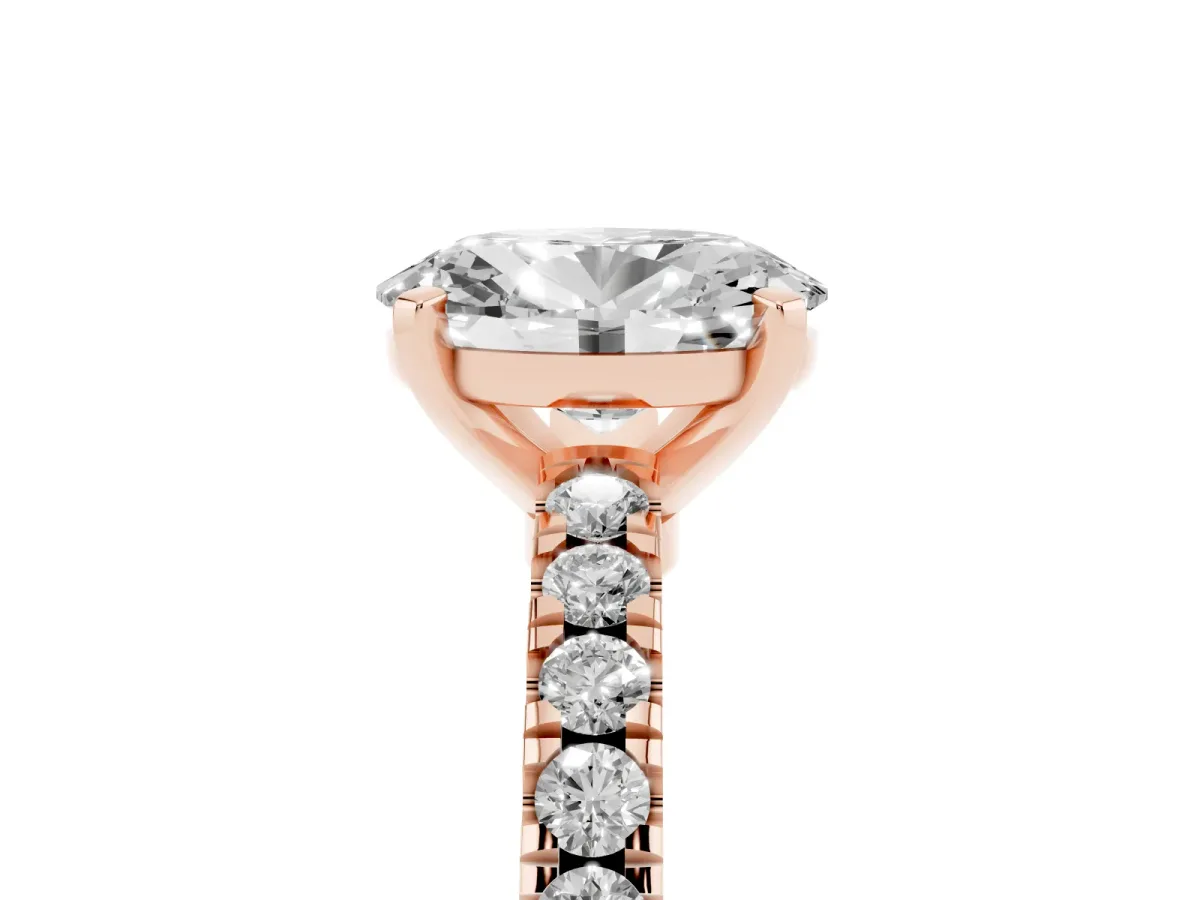 Oval Cut Solitaire Diamond with Pavé Band and Four-Prong Setting Rose gold