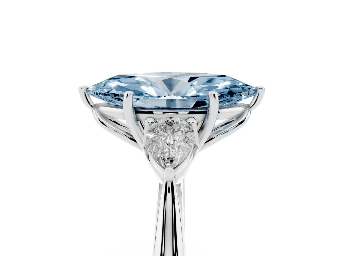 Fancy Blue Three-Stone Marquise Cut Brilliant Diamond Solitaire Ring with Tapered Band and Four-Prong Setting White gold