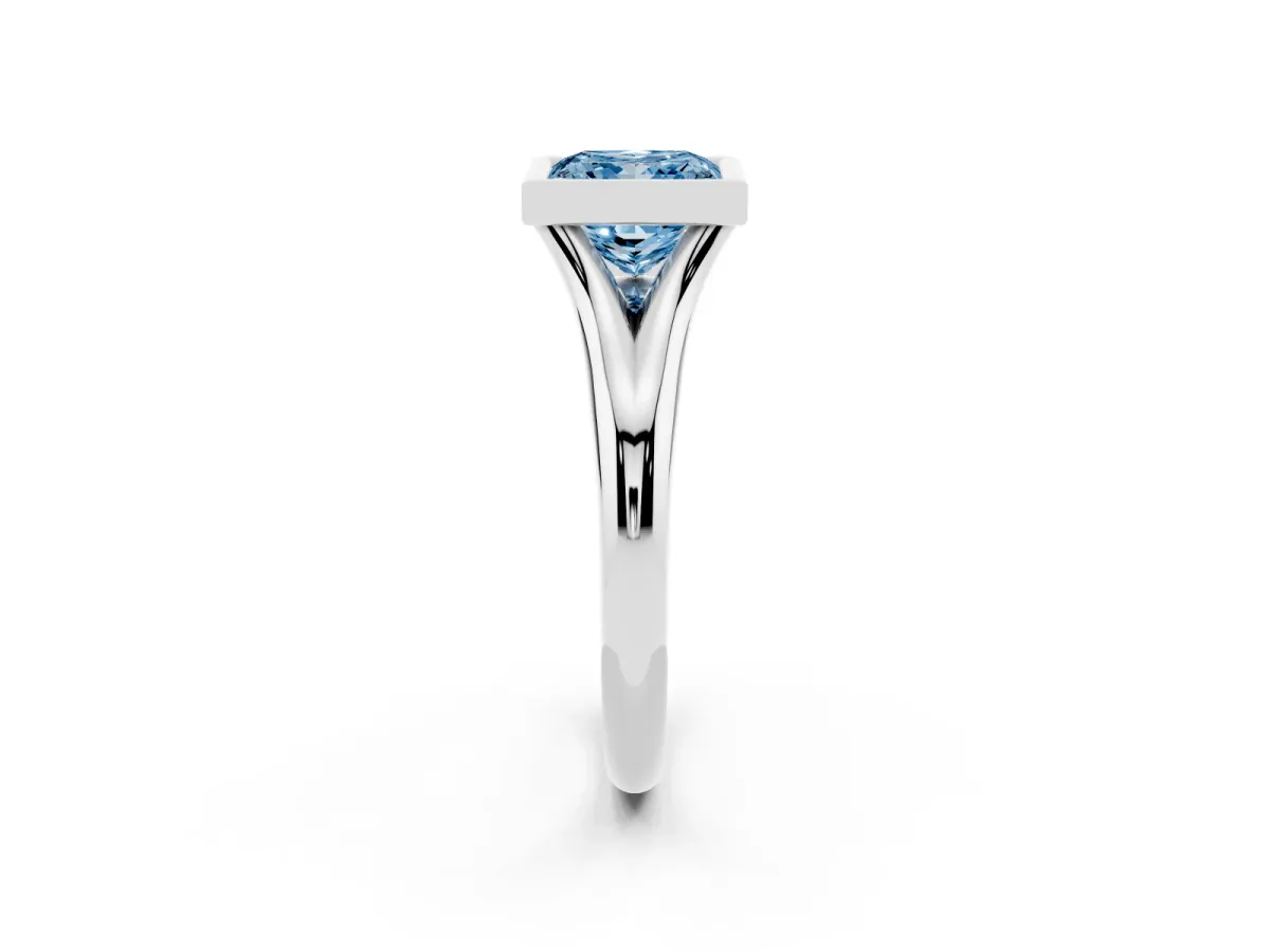 Fancy Blue Bezel Set Princess Cut Solitaire Diamond Ring with Smooth Band Silver
