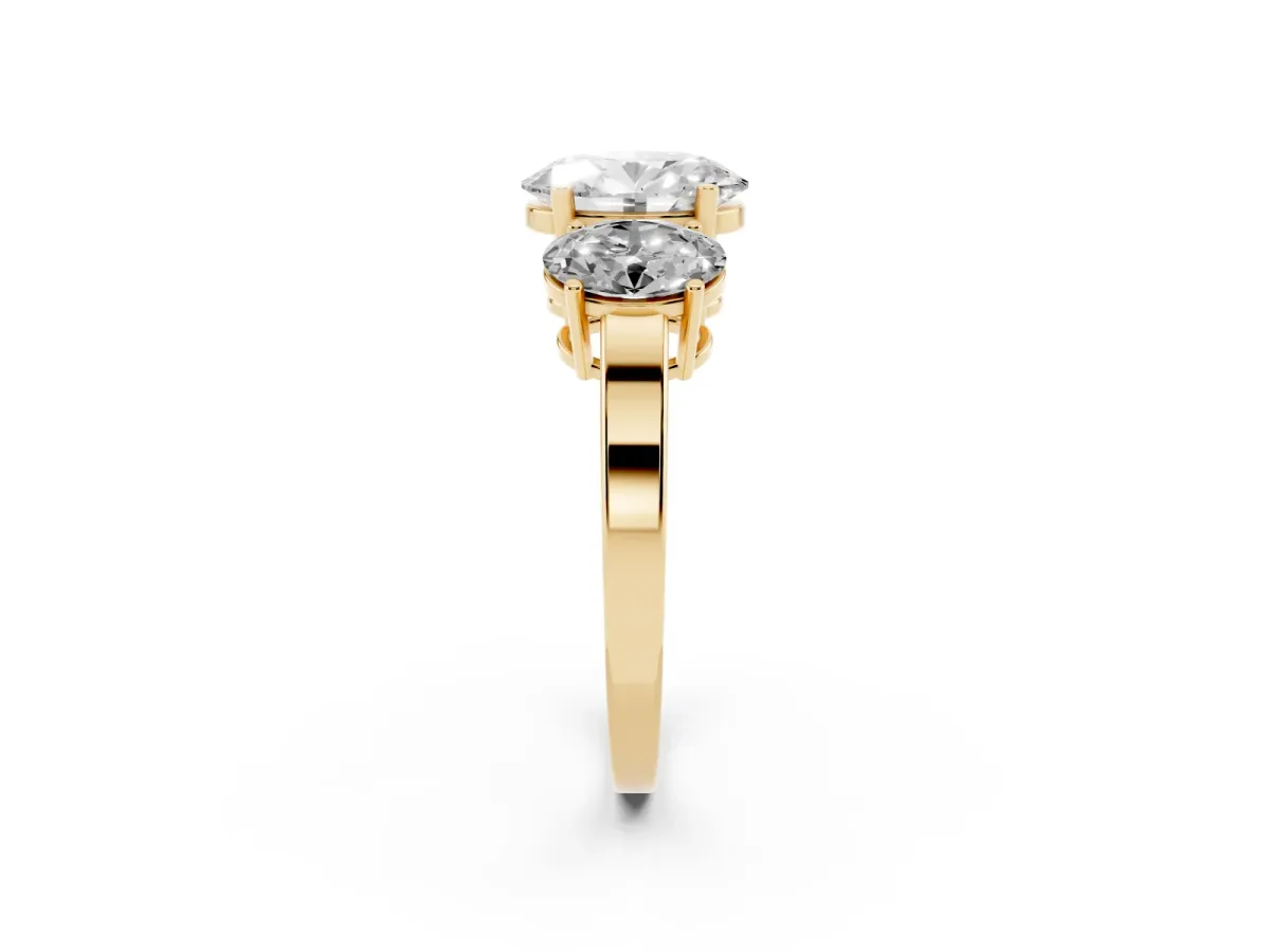 Three-Stone Oval Cut Cut Diamond Engagement Ring with Flat Band and Four-Prong Setting Yellow gold