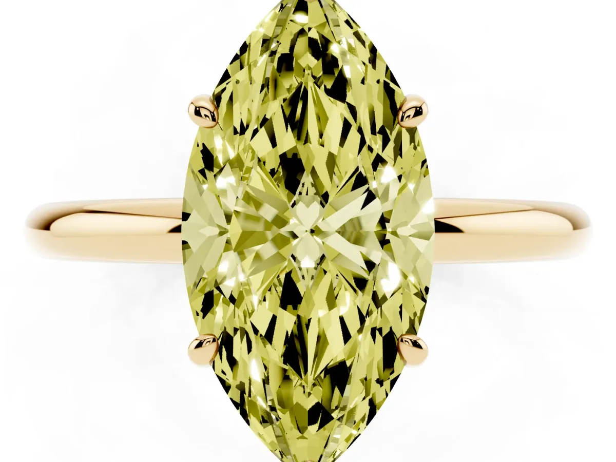 Fancy Yellow Marquise Cut Solitaire Diamond Ring with Four-Prong Setting on a Plain Band Yellow gold