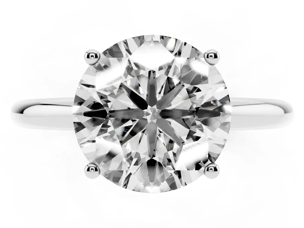 Round Cut Cut Solitaire Engagement Ring with Four-Prong Setting and Classic Band White gold