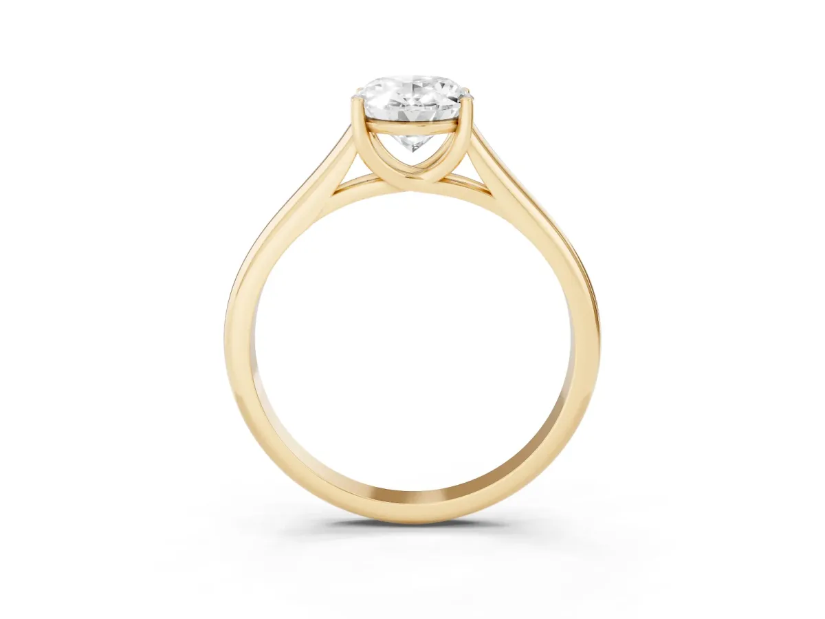 Oval Cut Solitaire Engagement Ring with Tapered Band and Four-Prong Setting Yellow gold