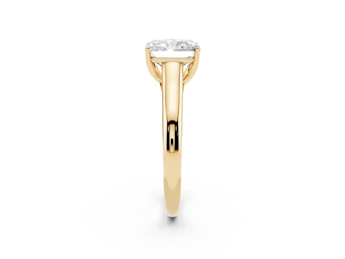 Radiant Cut Solitaire Engagement Ring with Tapered Band and Four-Prong Setting Yellow gold