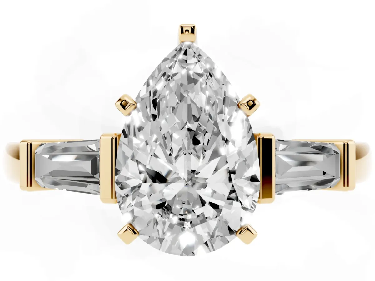 Pear Cut Cut Diamond Solitaire Ring with Tapered Baguette Accents and Four-Prong Setting Yellow gold
