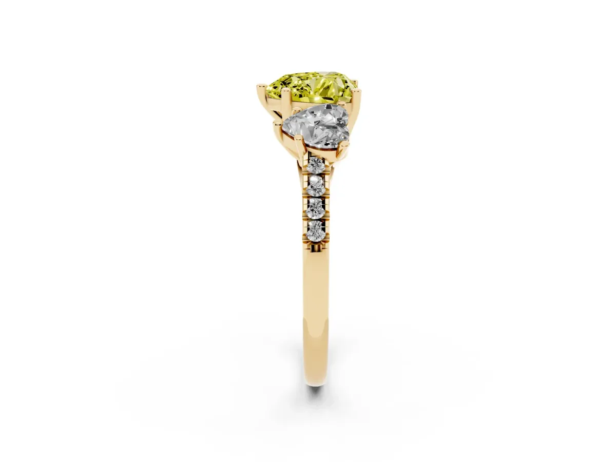 Fancy Yellow Three-Stone Heart Cut Diamond Ring with Round Pavé Band and Prong Setting Yellow gold