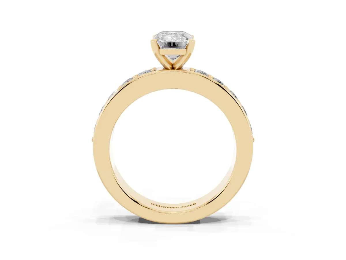 Emerald Cut Diamond Engagement Ring with Channel Set Round Band and Prong Setting Yellow gold