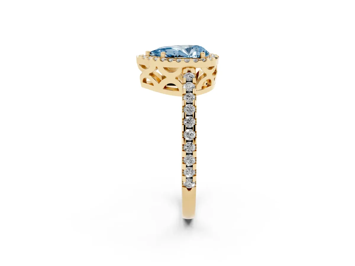 Fancy Blue Pear Cut Diamond Halo Engagement Ring with Pavé Band and Prong Setting Yellow gold