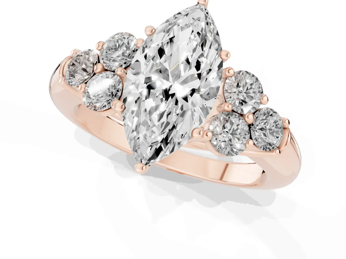 Marquise Cut Cut Diamond Cluster Ring with Round Accent Stones and Prong Setting on a Classic Band Rose gold