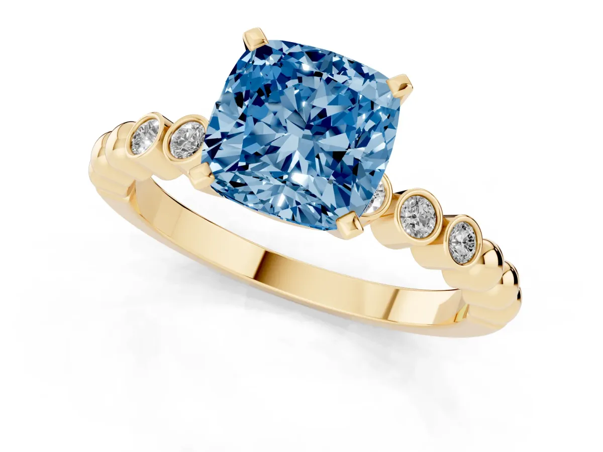 Fancy Blue Cushion Cut Solitaire Bezel Accent Diamond Engagement Ring with Beaded Band and Four-Prong Setting Yellow gold