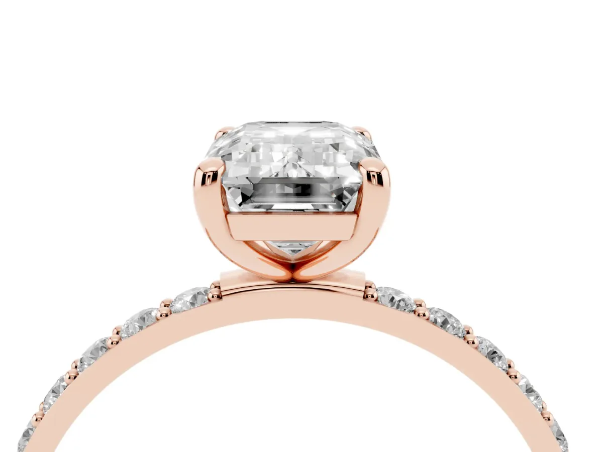 Emerald Cut Diamond Solitaire Ring with Round Pavé Band and Prong Setting Rose gold