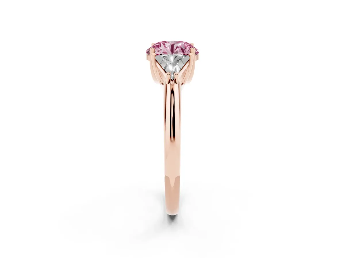 Fancy Pink Three-Stone Round Cut Diamond Engagement Ring with Trillion Side Stones and Prong Setting Rose gold