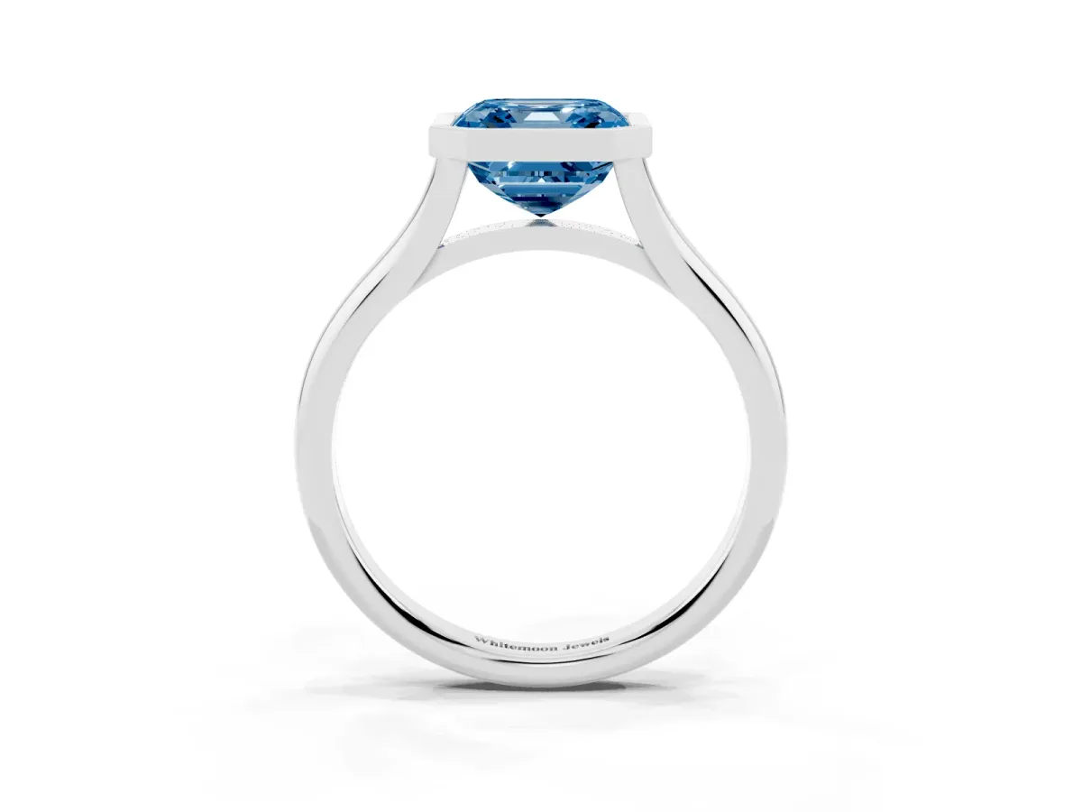 Fancy Blue Bezel Set Asscher Cut Cut Solitaire Ring with Tapered Band Silver