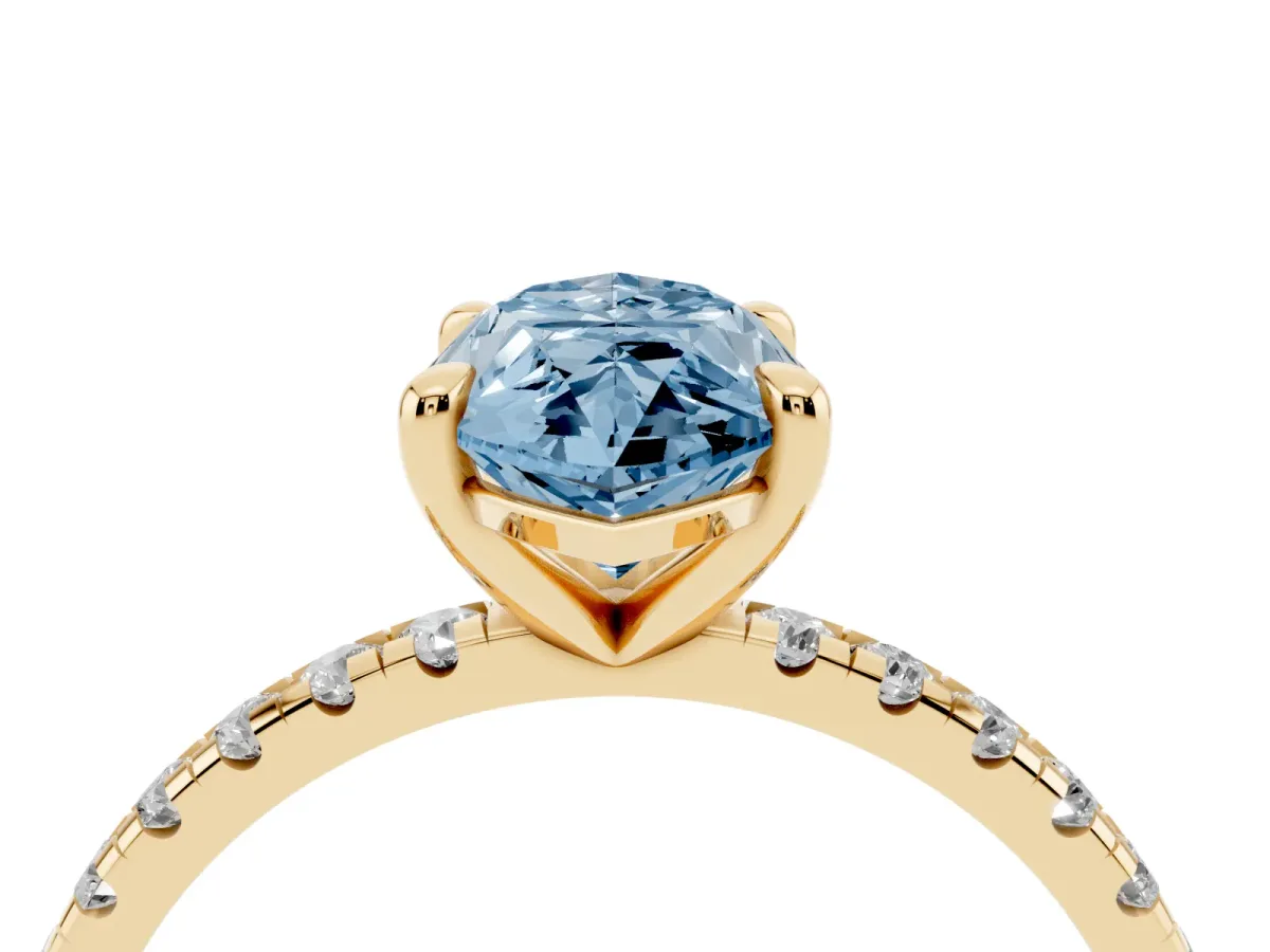 Fancy Blue Marquise Cut Diamond Brilliant Solitaire Ring with Pavé Band and Four-Prong Setting Yellow gold