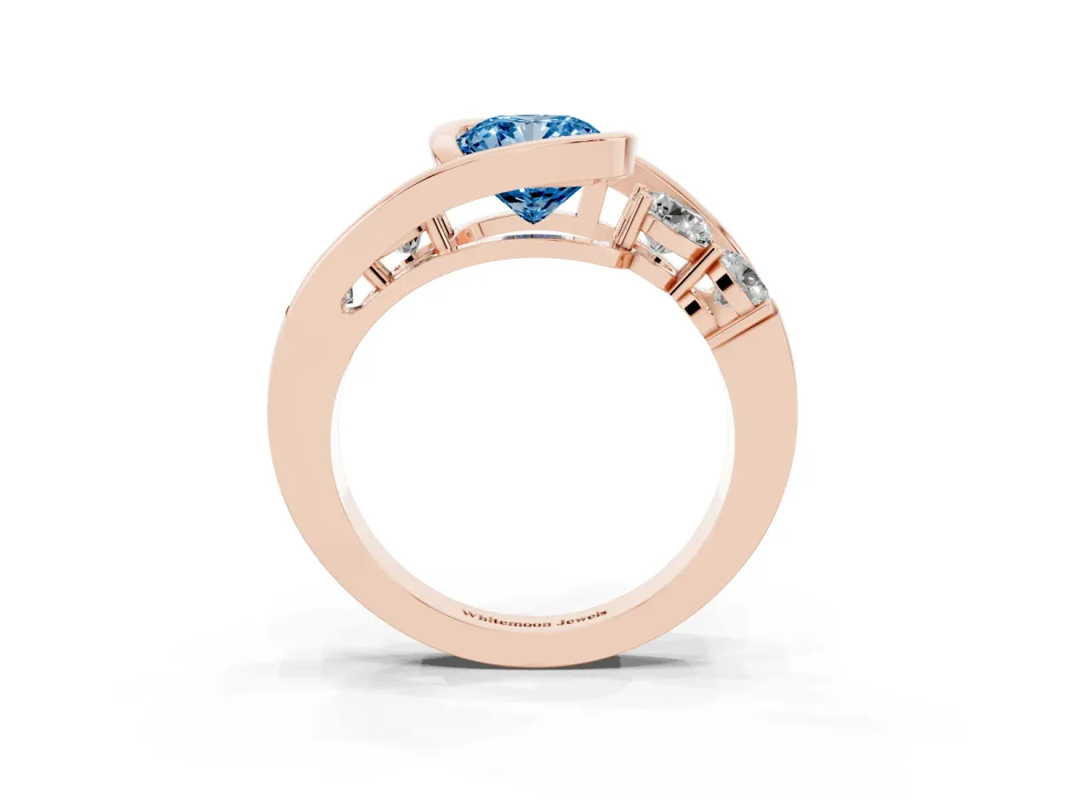 Fancy Blue Bezel Set Cushion Cut Diamond Bypass Ring with Round Accents Rose gold