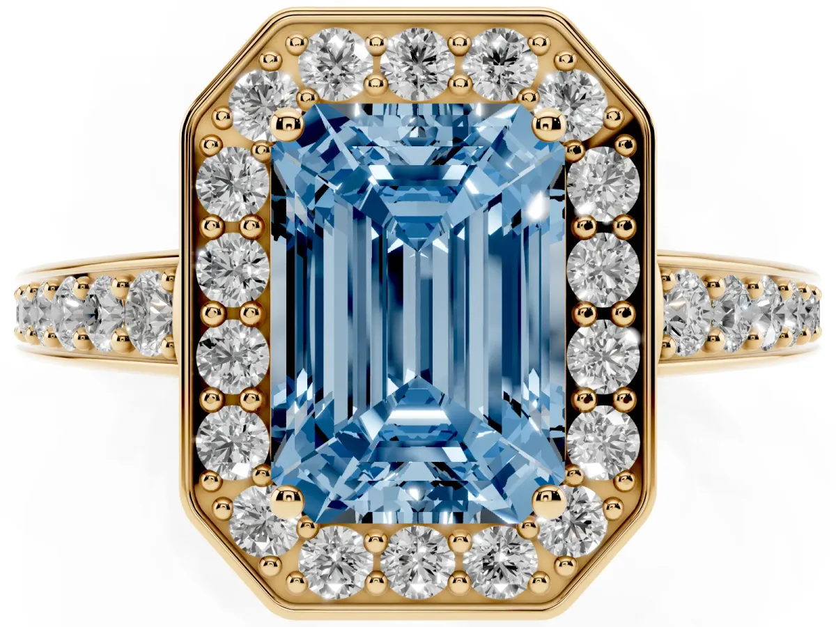 Fancy Blue Emerald Cut Halo Pavé Diamond Engagement Ring with Bezel Setting Yellow gold