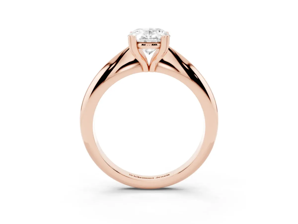 Oval Cut Cut Solitaire Engagement Ring with Tapered Band and Four-Prong Setting Rose gold