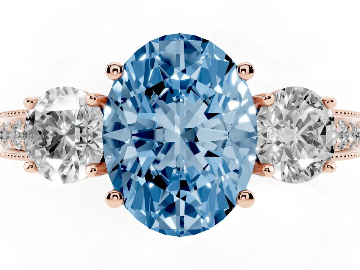 Fancy Blue Oval Cut Three-Stone Diamond Ring with Pavé Band and Four-Prong Setting Rose gold