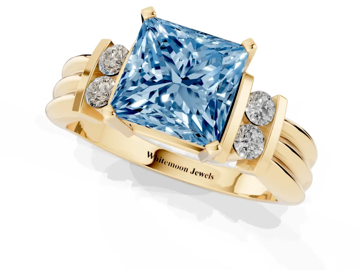 Fancy Blue Princess Cut Cut Three-Stone Channel Set Ring with Bar Prongs Yellow gold