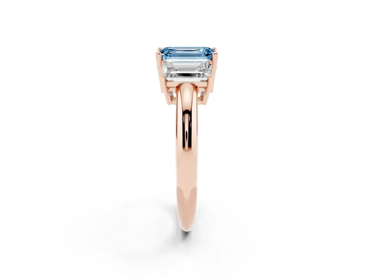 Fancy Blue Three-Stone Emerald Cut Cut Diamond Engagement Ring with Prong Setting on a White Gold Band Rose gold