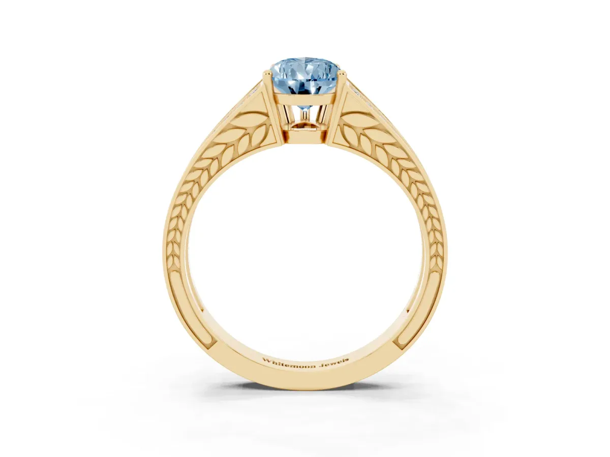 Fancy Blue Pear Cut Diamond Split Shank Ring with Pavé Band and Four-Prong Setting Yellow gold