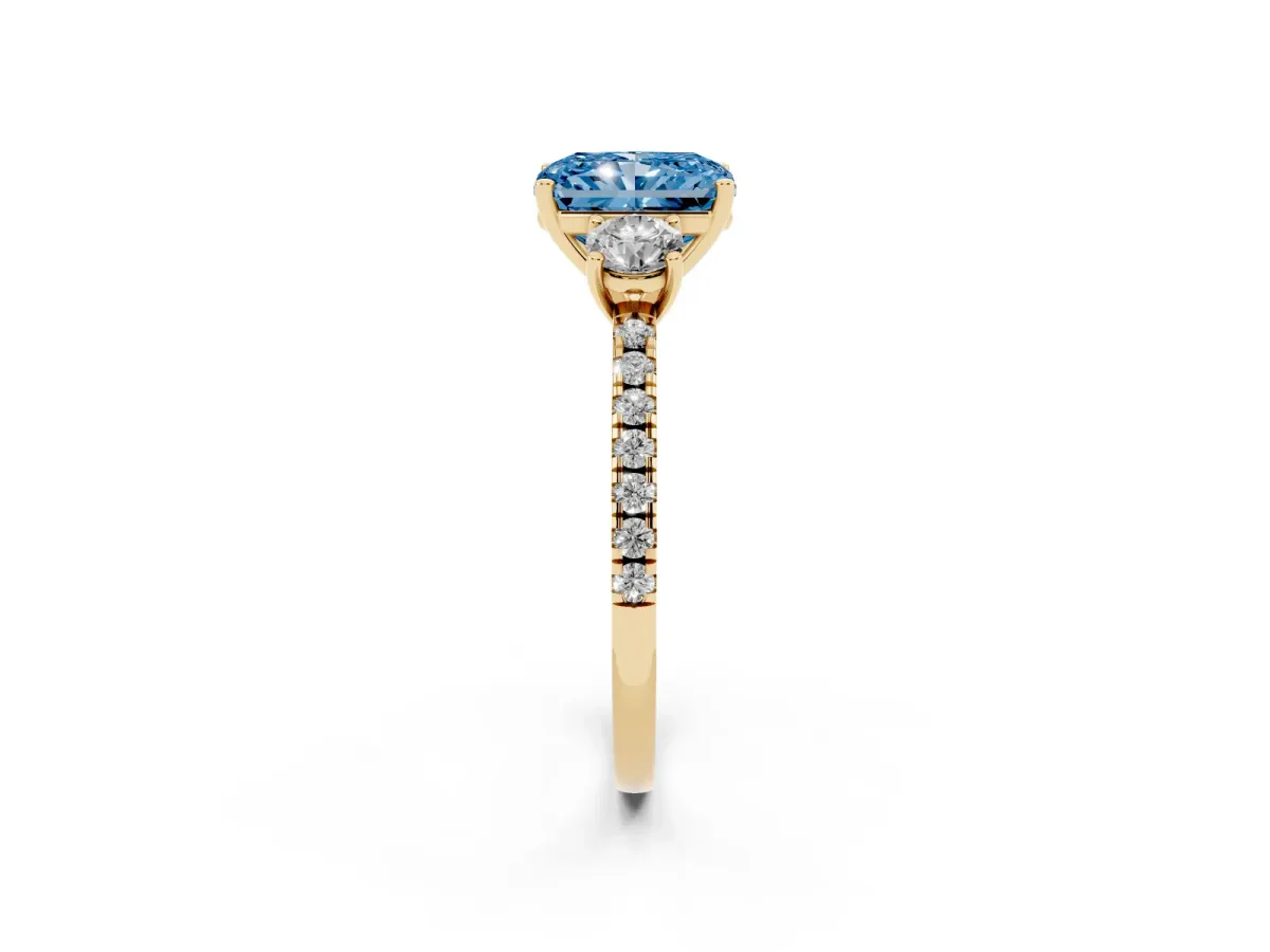Fancy Blue Three-Stone Radiant Cut Cut Diamond Pavé Band with Prong Setting Yellow gold