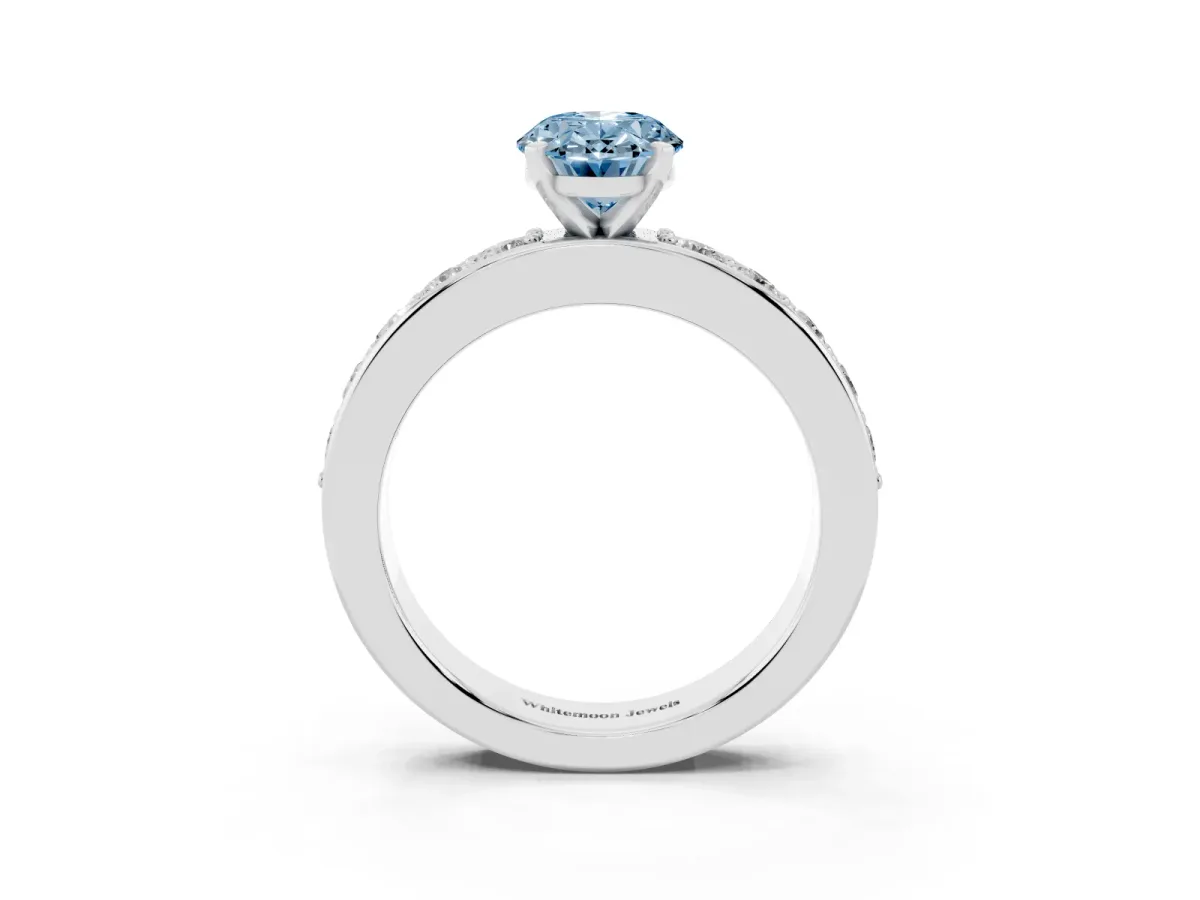 Fancy Blue Oval Cut Diamond Engagement Ring with Channel Set Round Band and Prong Setting Silver