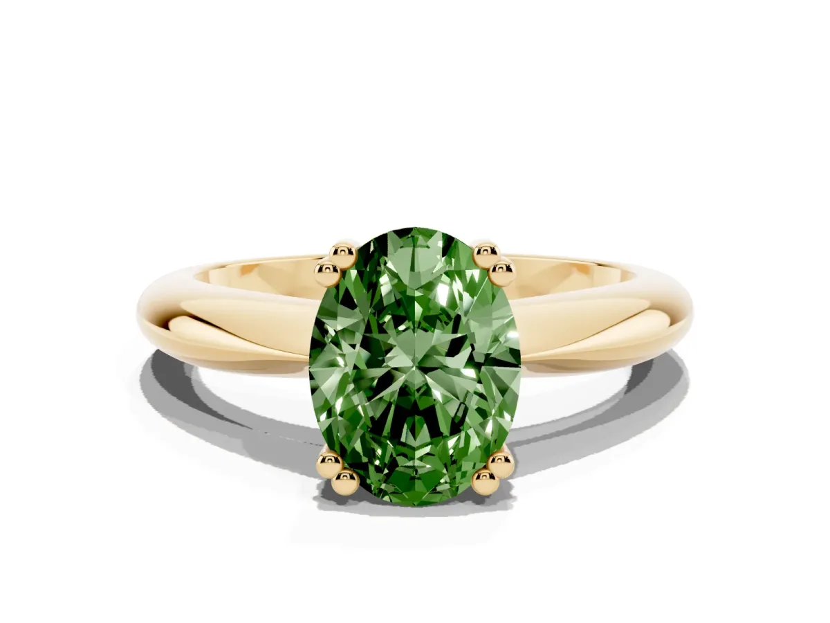 Fancy Green Oval Cut Cut Solitaire Engagement Ring with Tapered Band and Four-Prong Setting Yellow gold