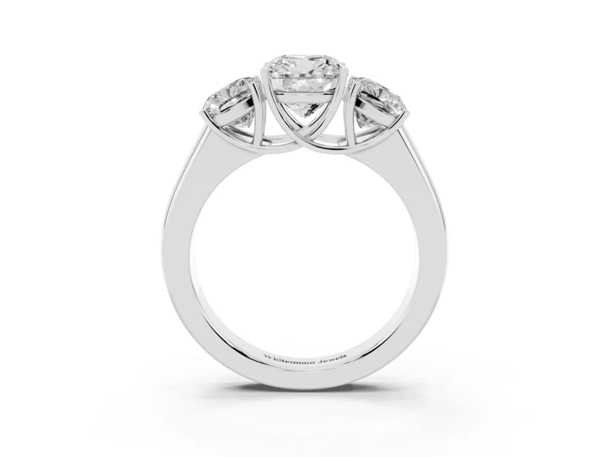 Three-Stone Cushion Cut Cut Diamond Ring with Prong Setting and Classic Band Platinum