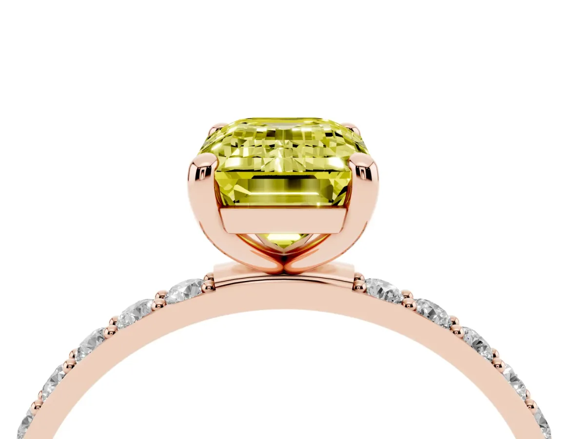 Fancy Yellow Emerald Cut Diamond Solitaire Ring with Round Pavé Band and Prong Setting Rose gold