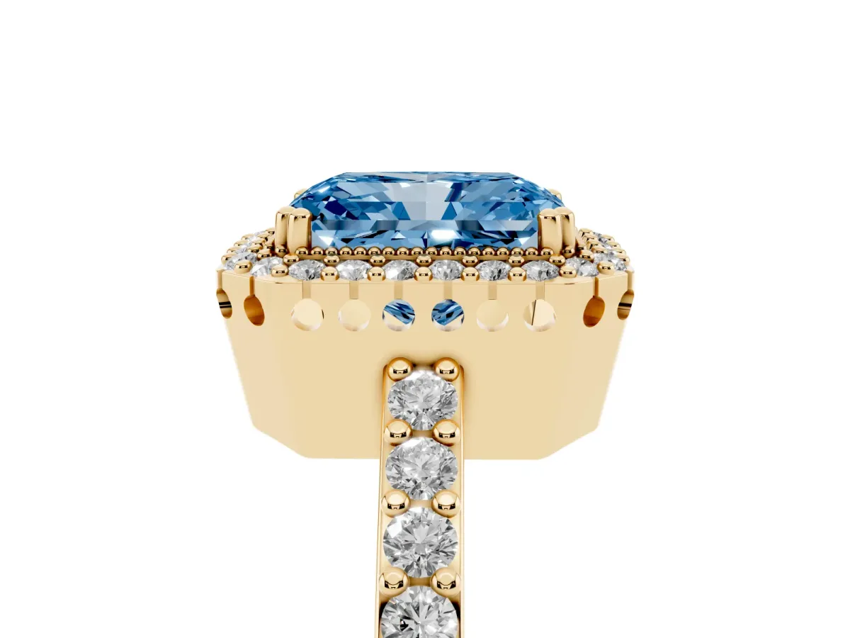 Fancy Blue Radiant Cut Cut Diamond Halo Engagement Ring with Milgrain Detail and Pavé Band Yellow gold