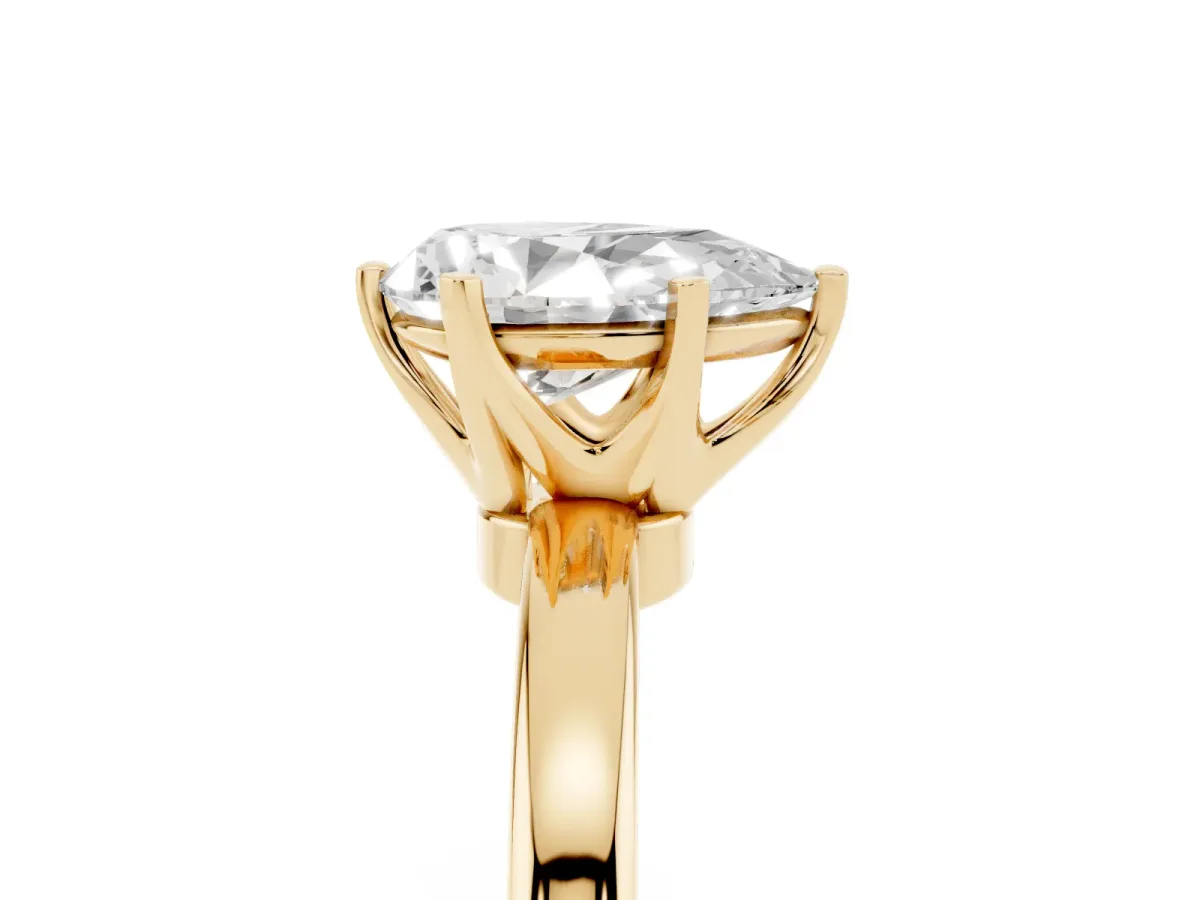 Pear Cut Solitaire Diamond Ring with Six-Prong Setting on a Classic Band Yellow gold