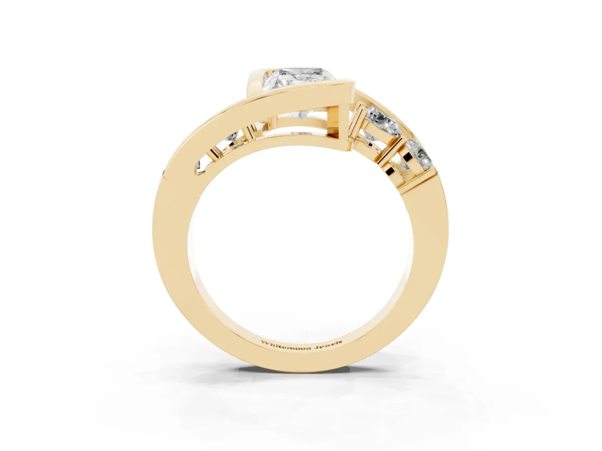 Bezel Set Radiant Cut Diamond Bypass Ring with Round Accents Yellow gold