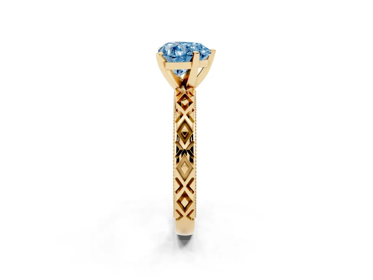 Fancy Blue Heart Cut Solitaire Diamond Ring with Milgrain and Black Enamel X Pattern Band Yellow gold