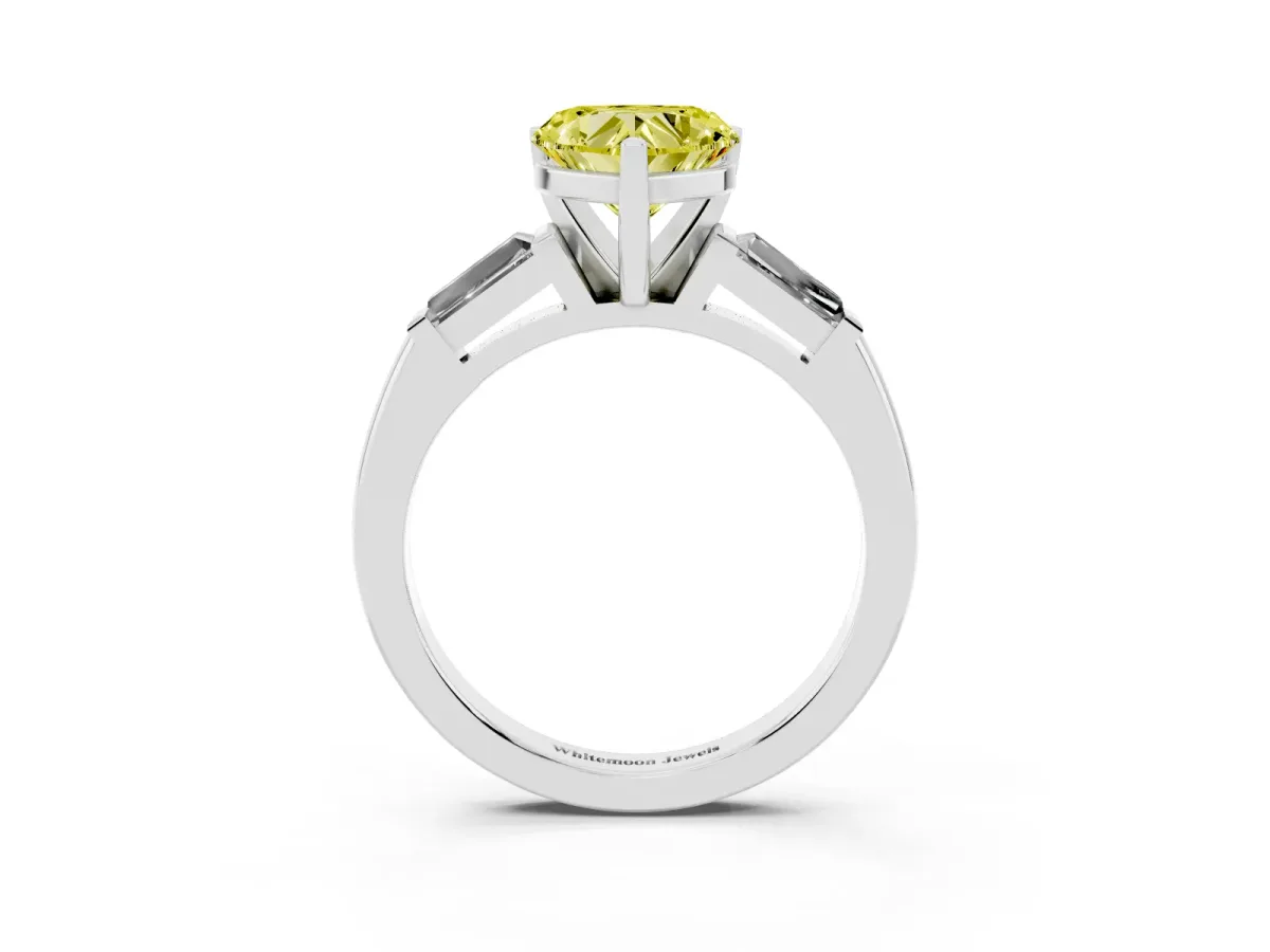 Fancy Yellow Heart Cut Solitaire with Tapered Baguette Side Stones on a Classic Band with Four-Prong Setting Platinum