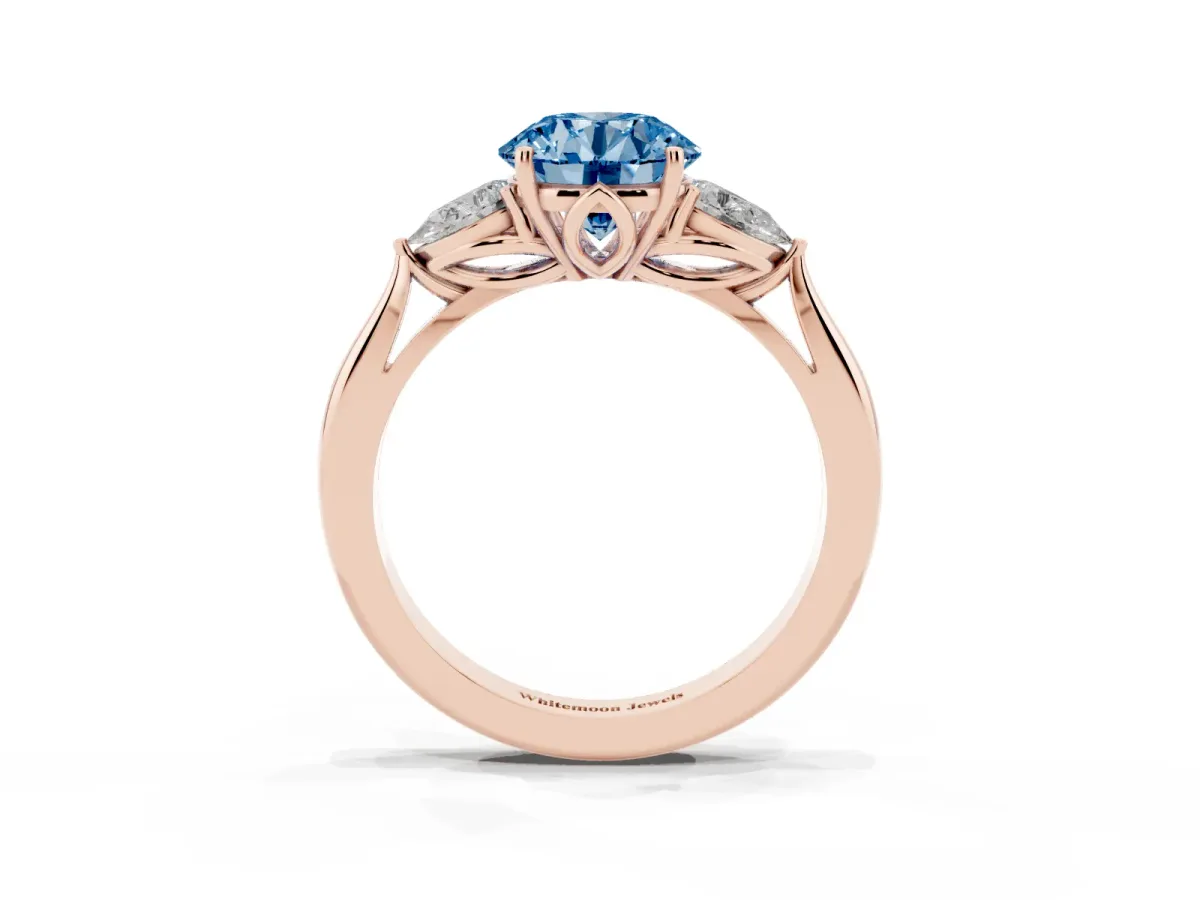 Fancy Blue Round Cut Diamond Three-Stone Ring with Pear Side Stones and Prong Setting Rose gold